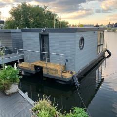 Unique new houseboat moored 4