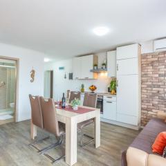 Apartment in Njivice with sea view, balcony, air conditioning, WiFi (4930-1)