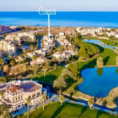 Villa con jardín en Oliva Nova Golf a 100m de la playa