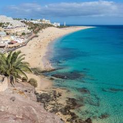 Apartment near the beach with a huge terrace, patio, wifi and parking