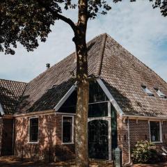 Monumentale stolpboerderij voorzien van alle gemakken van nu!