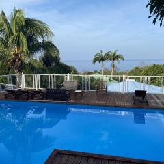Maison de 2 chambres a Pointe Noire a 150 m de la plage avec vue sur la mer piscine partagee et jardin clos