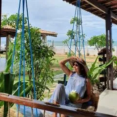 Studio pé na areia com 2 quartos, sala e cozinha