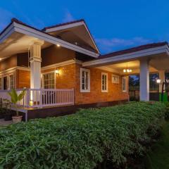 StayVista's Wandering Greens - Mountain-View Villa with Pool, Spacious Lawn & Balcony