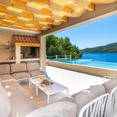 Beachfront Villa BrulupeS in secluded bay