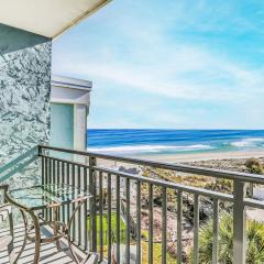 Polished oceanfront condo with pool access, private balcony & washer/dryer