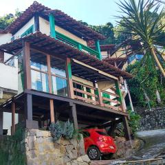 Excelente casa em Angra dos Reis condomínio com praia e piscina.