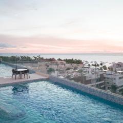 1BR condo de lujo a pasos del mar y de la 5ta avenida