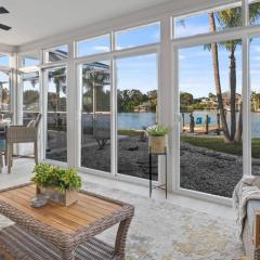 Waterside Retreat is a Spectacular Waterfront Apollo Beach Home with screened in Heated Pool