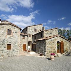 In a wonderful medieval village on the Tuscan hills, with air conditioning