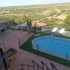 Casas Cuevas El Mirador con piscina y barbacoa