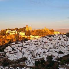 Stylish 3 bed house 2 bathrooms with patio, roof terrace and communal pool 5 minutes away from the beautiful Spanish white village of Casares Pueblo and only 20 mins from the sea