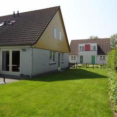 Nice holiday home with garden, on a holiday park 200m from the beach