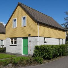 Nice holiday home with sauna, in a holiday park only 200m away from the beach