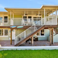 Updated home across from beach with covered balcony, central AC, & washer/dryer