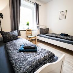 Ruhige 2 Schlafzimmer Wohnung: 5 Einzelbetten + Küche, modernes Bad, TV, Waschmaschine