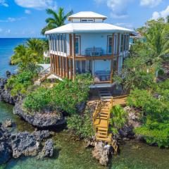 Awesome over the water overlooking West End - Aire Agua home