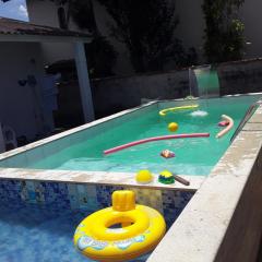 CASA DE PRAIA COM DUAS PISCINAS E GARAGEM