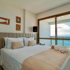 Quarto e Sala com vista mar e comodidades modernas