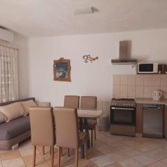 Apartment in Povlja with sea view, balcony, air conditioning WiFi 4936-1 -2 -3