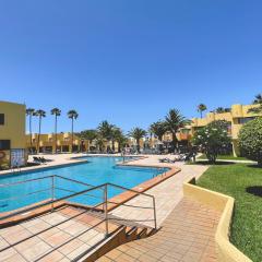 Seaside Apartment Corralejo : A cozy holiday home in a peaceful well located green complex