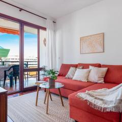 Central beach apartment with free parking and pool