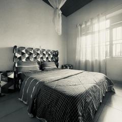 Room in House - Spacious double room muhazi MyPlace