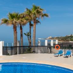 Beachfront sea view in cozy 1BR with pool and garage