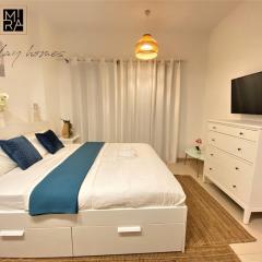 Mira Holiday Homes - New studio in Town Square - Gym & Pool