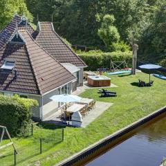 Majestic holiday home in Friesland with Jetty