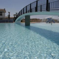 Modern flat with big swimming pool and balcony