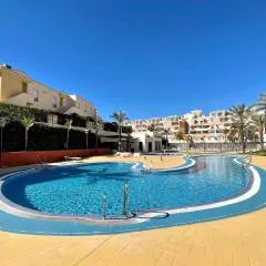 Apartment near beach with pools and hot tub