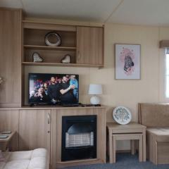 A22 is a 3 bedroom, 8 berth caravan close to the beach on Whitehouse Leisure Park, Towyn, Abergele, near Rhyl with decking This is a pet free caravan
