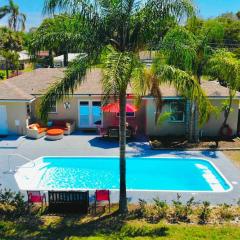 Heated pool tropical paradise 9 minutes to beach