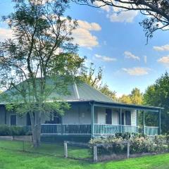 Old Schoolmaster's Cottage on the Barrington River