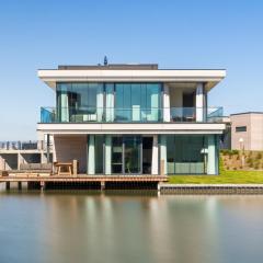 Luxury villa with boathouse on the Veerse Meer