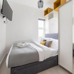 Functional Budget Stay with Wi-Fi and Laundry Facilities near Tube Station