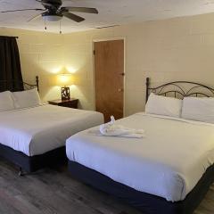 JI10, a Queen Guest Room at the Joplin Inn, at the entrance to Mountain Harbor Resort Hotel Room