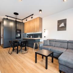 Żoliborz Obsidian Apartment