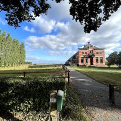 Eigen appartement op boerderij tussen de velden.