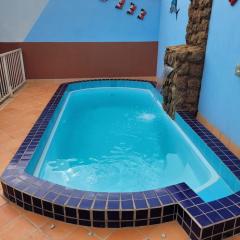 Casa com piscina para 6