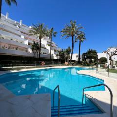 Impeccable large apartment with immense terrace and private garden overlooking the mountain, featuring 2 bedrooms and sleeping up to 4 guests located 100 meters from Plaza Maestranza