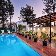StayVista's Vinho Sunsets - Farm-View Villa Near Sula with Pool & Terrace