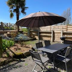 Maison chaleureuse avec terrasse et vue baie