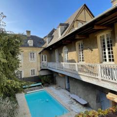 La Maison aux murs anciens et ses chambres