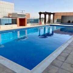 Spacious 1BHK Condo with Pool, Gym, Sauna, Hamaam and more