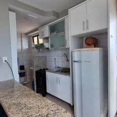 Apartamento pé na areia