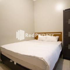 De Kost Solo Mitra RedDoorz