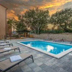 Apartments Cesare with Shared Pool