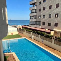 Apartment on the beach with parking and pool